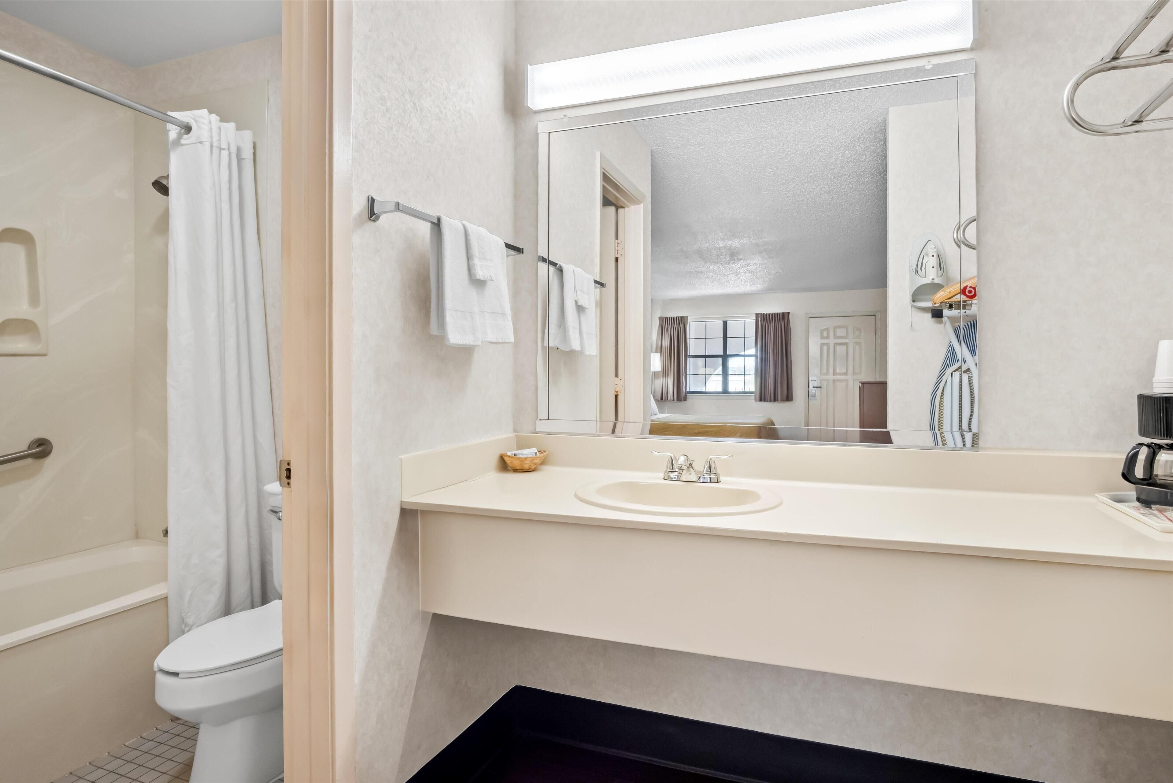 Combined shower/tub, eco-friendly toiletries, hair dryer, towels