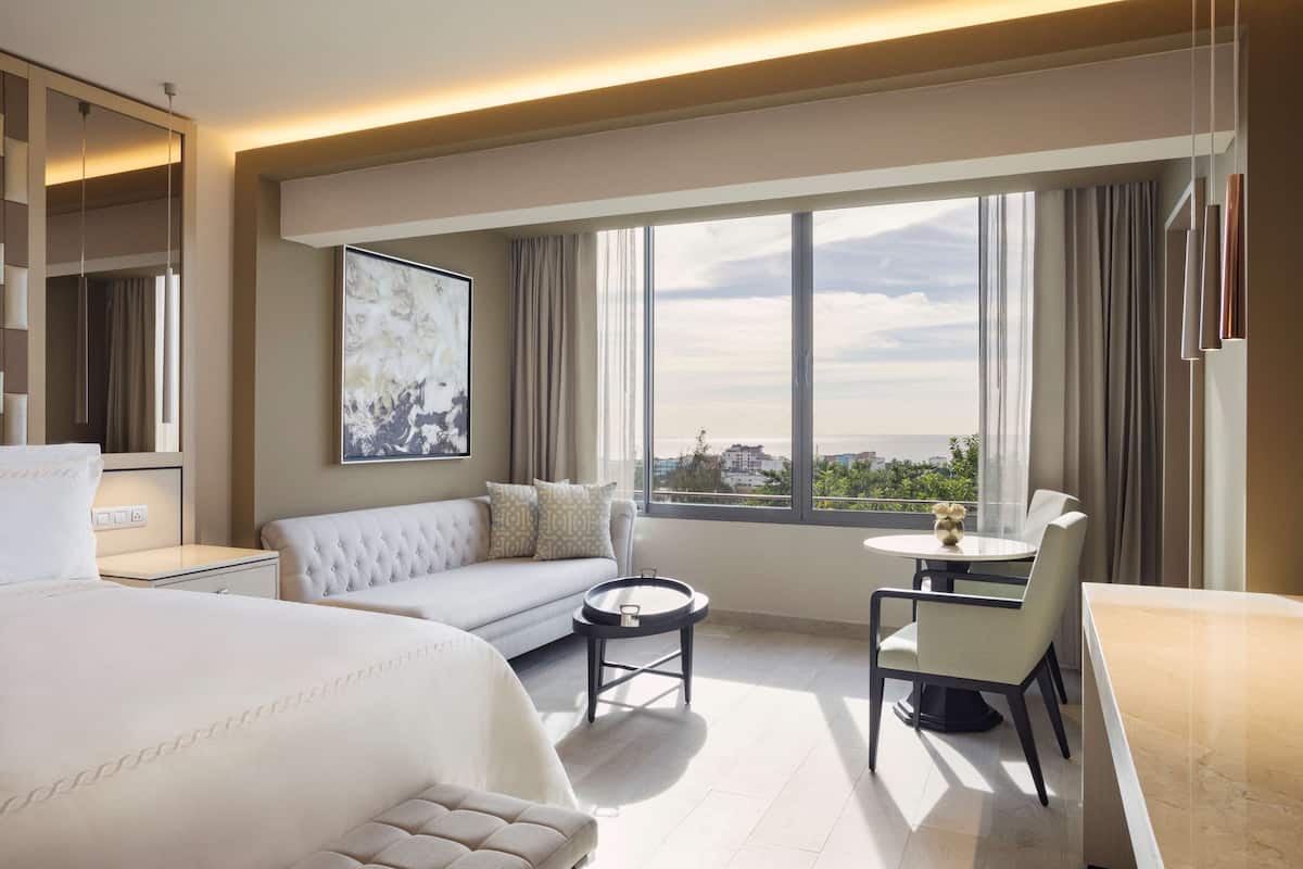 Premium bedding, pillow-top beds, minibar, in-room safe