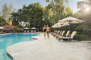 Outdoor pool, open 7:30 AM to 7:30 PM, pool umbrellas, pool loungers