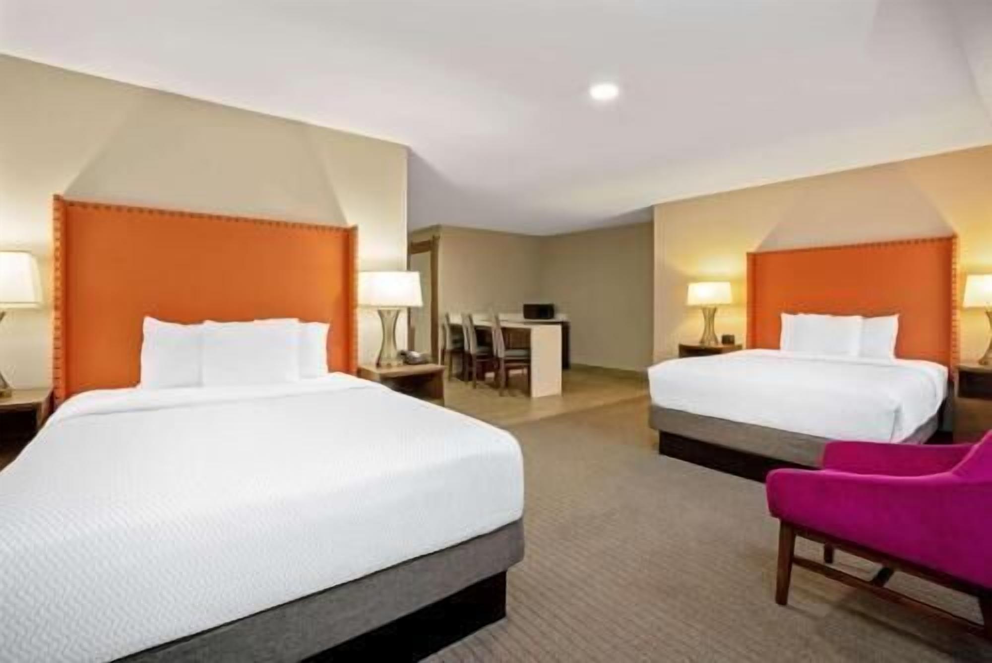 Premium bedding, desk, blackout drapes, iron/ironing board