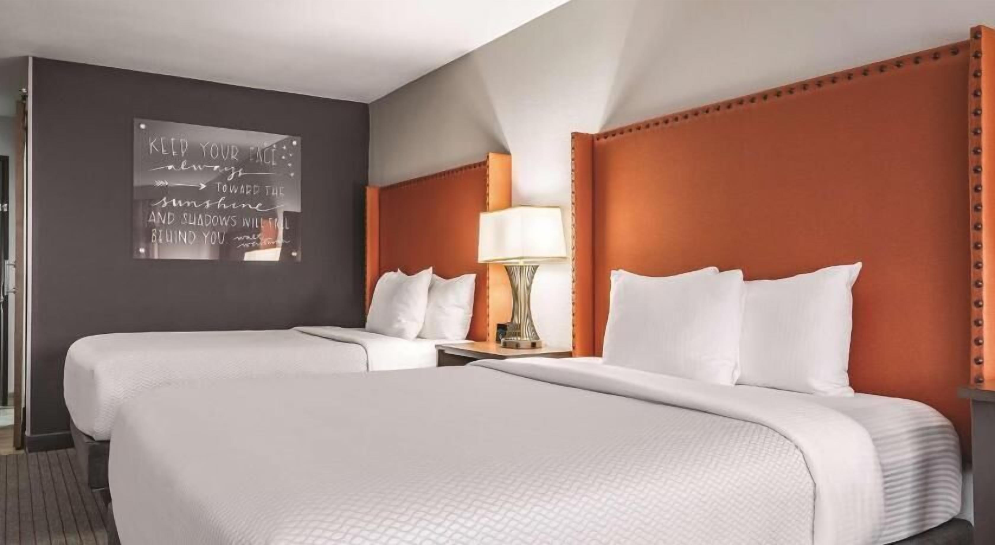 Premium bedding, desk, blackout drapes, iron/ironing board
