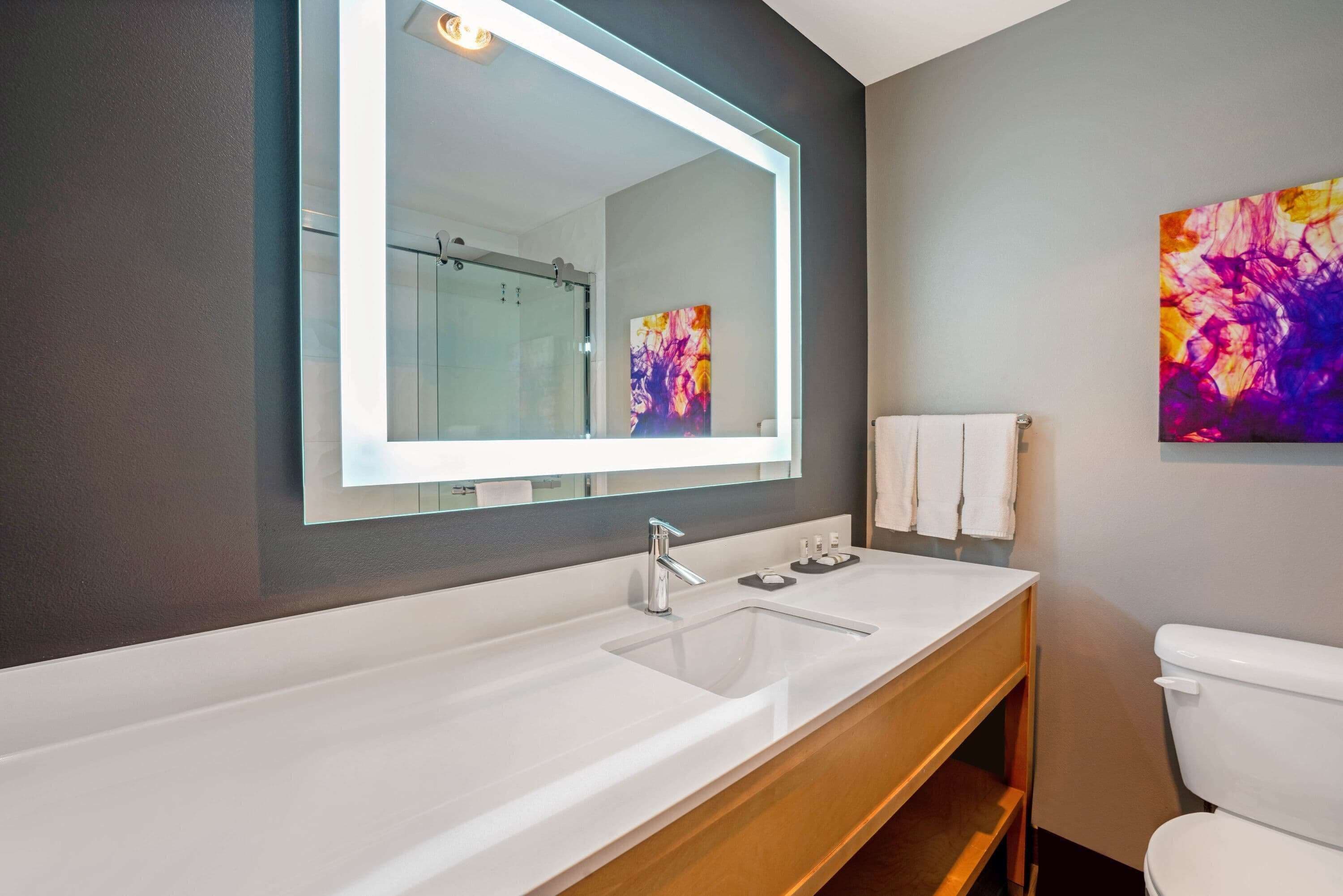 premium bedding, desk, blackout curtains, iron/ironing board