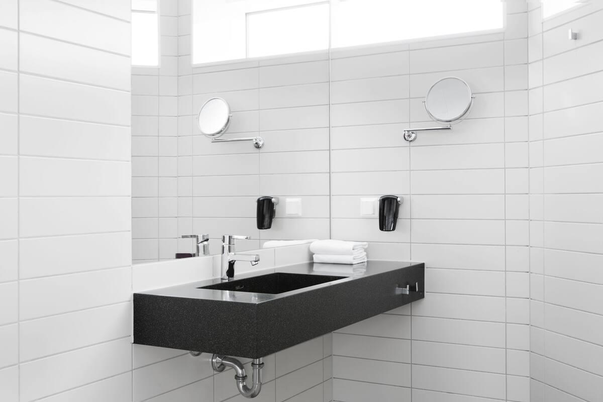 shower, eco-friendly toiletries, hair dryer, towels