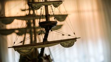 A close-up of a ship's rigging and sails.
