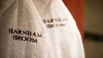 A close-up of a white towel with the text "Barnham Broom" embroidered on it.