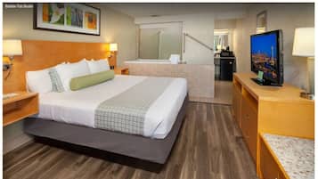 Standaard kamer, 1 kingsize bed, niet-roken, bubbelbad | Een bureau, een laptopwerkplek, een strijkplank/strijkijzer, gratis wifi