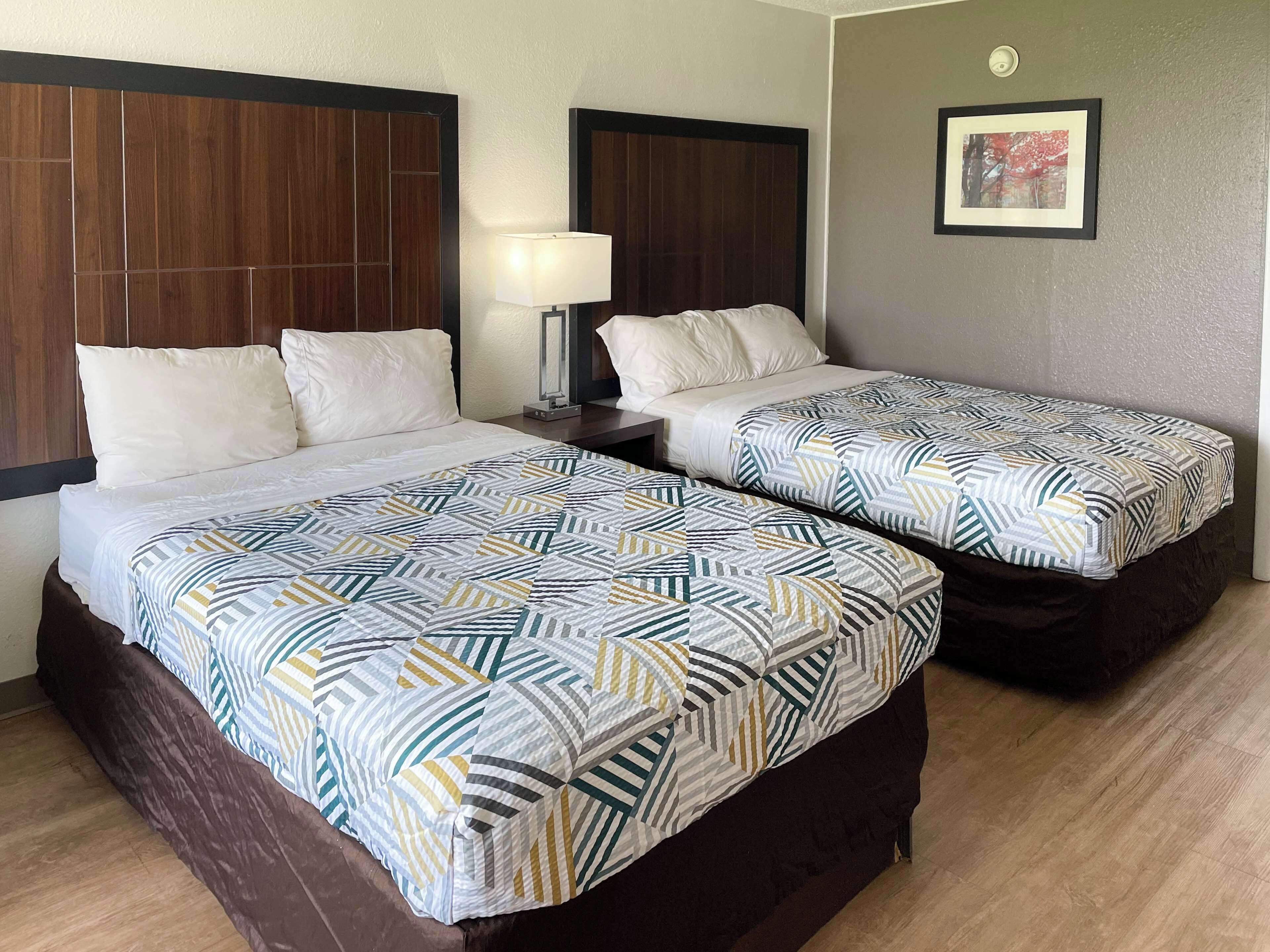 Pillow-top beds, desk, free WiFi, bed sheets