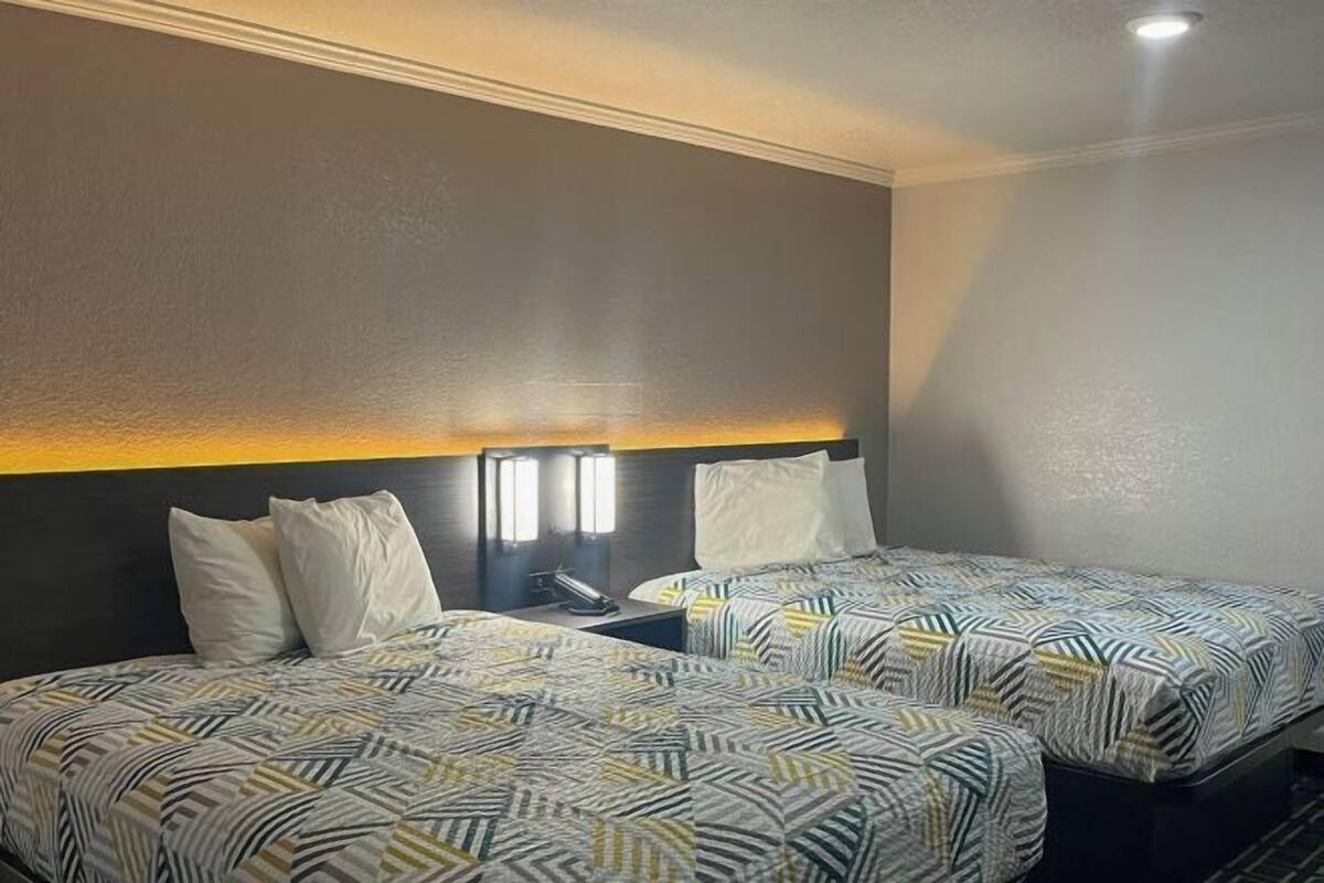 Pillow-top beds, desk, free WiFi, bed sheets