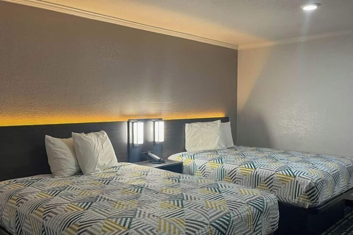 Pillow-top beds, desk, free WiFi, bed sheets