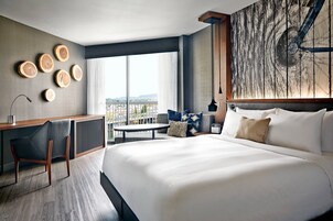 Hypo-allergenic bedding, down comforters, pillowtop beds, in-room safe