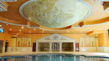Swim in style surrounded by elegant columns and beautiful artworks.