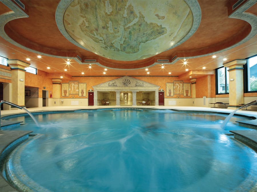 2 indoor pools, seasonal outdoor pool, pool umbrellas, pool loungers