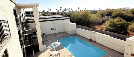 Outdoor pool, open 6 AM to 10 PM, sun loungers
