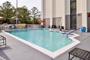 Seasonal outdoor pool, open 8:00 AM to 8:00 PM, pool umbrellas