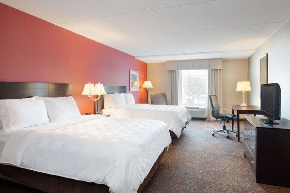 A hotel room with two beds, a desk, a chair, and a television. - Holiday Inn Norwich by IHG (Norwich)