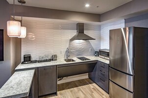 Fridge, microwave, coffee/tea maker, highchair