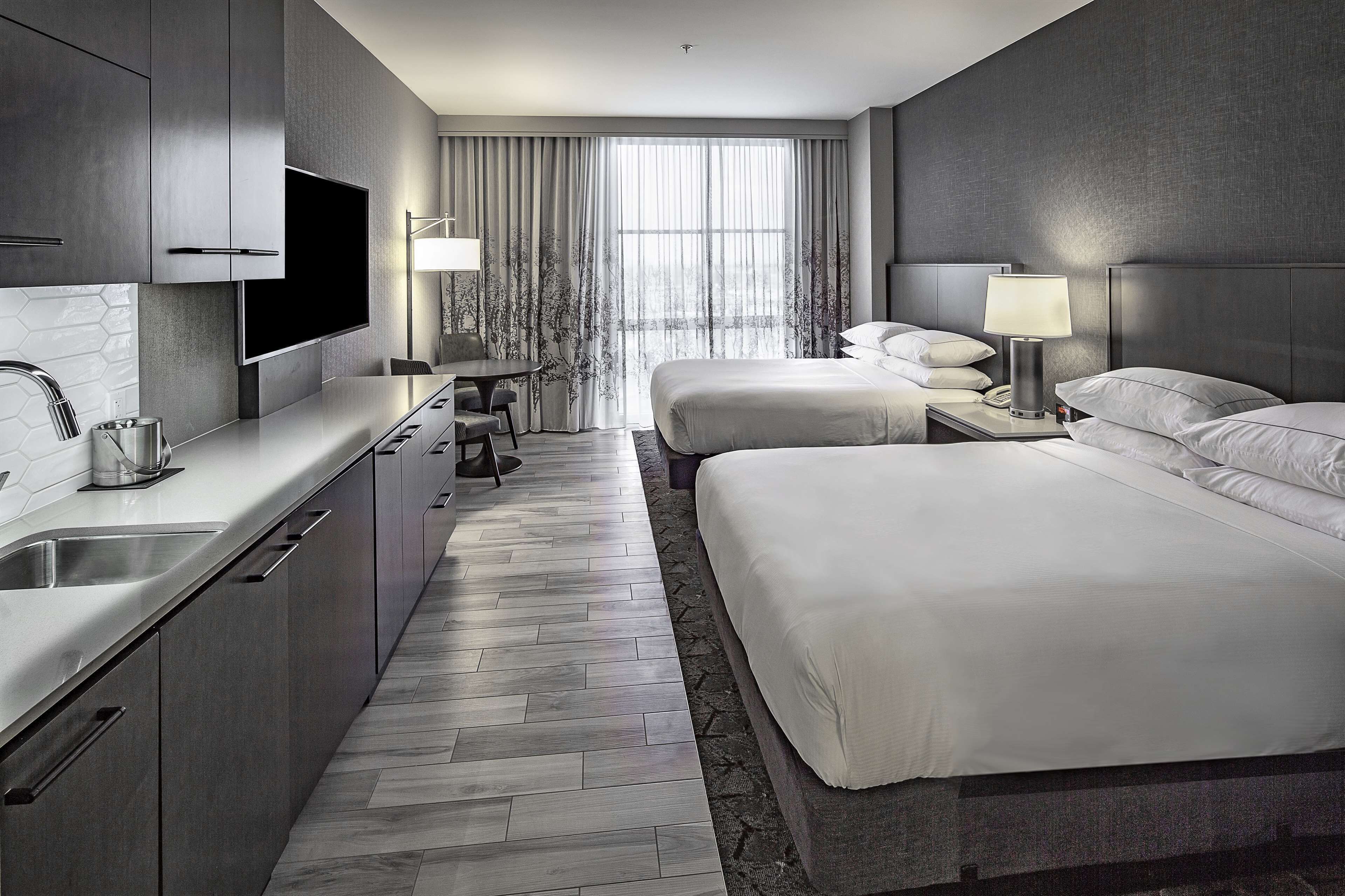 Studio, 2 Queen Beds, Kitchenette | Private kitchen | Fridge, microwave, coffee/tea maker, highchair