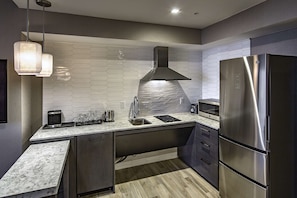 Fridge, microwave, coffee/tea maker, highchair