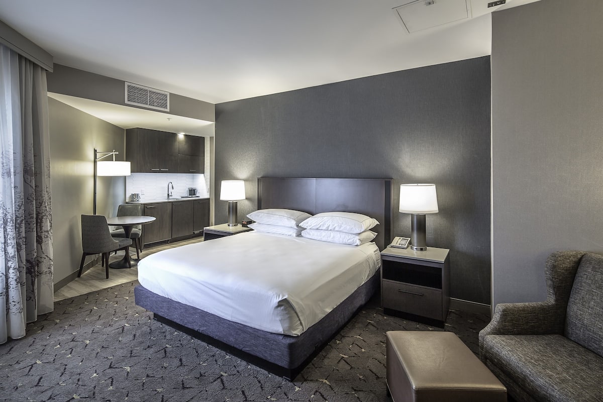 Suite, 1 King Bed, Kitchenette, Corner | Premium bedding, in-room safe, desk, blackout curtains