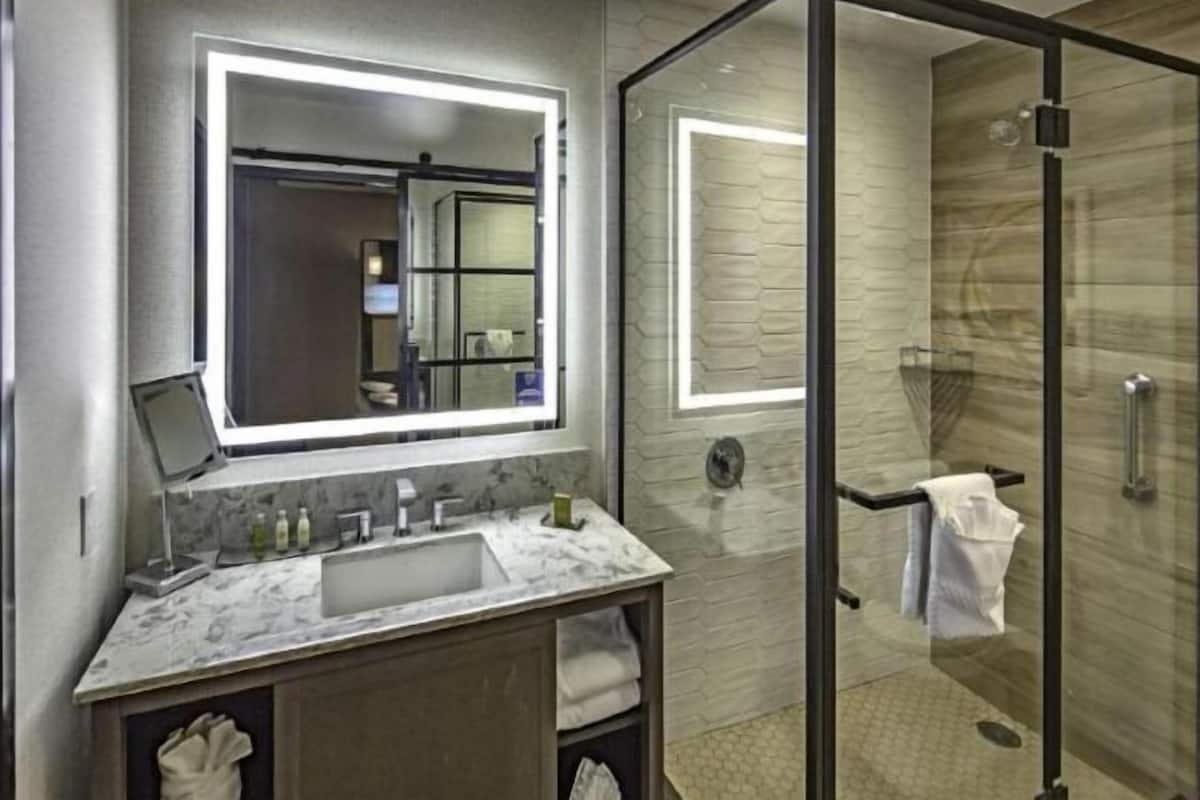 Bathroom | Eco-friendly toiletries, hair dryer, towels, soap