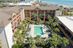 Outdoor pool, open 10:00 AM to 10 PM, pool umbrellas, sun loungers