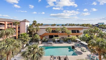 Outdoor pool, open 10:00 AM to 10 PM, pool umbrellas, pool loungers