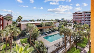 Outdoor pool, open 10:00 AM to 10 PM, pool umbrellas, sun loungers