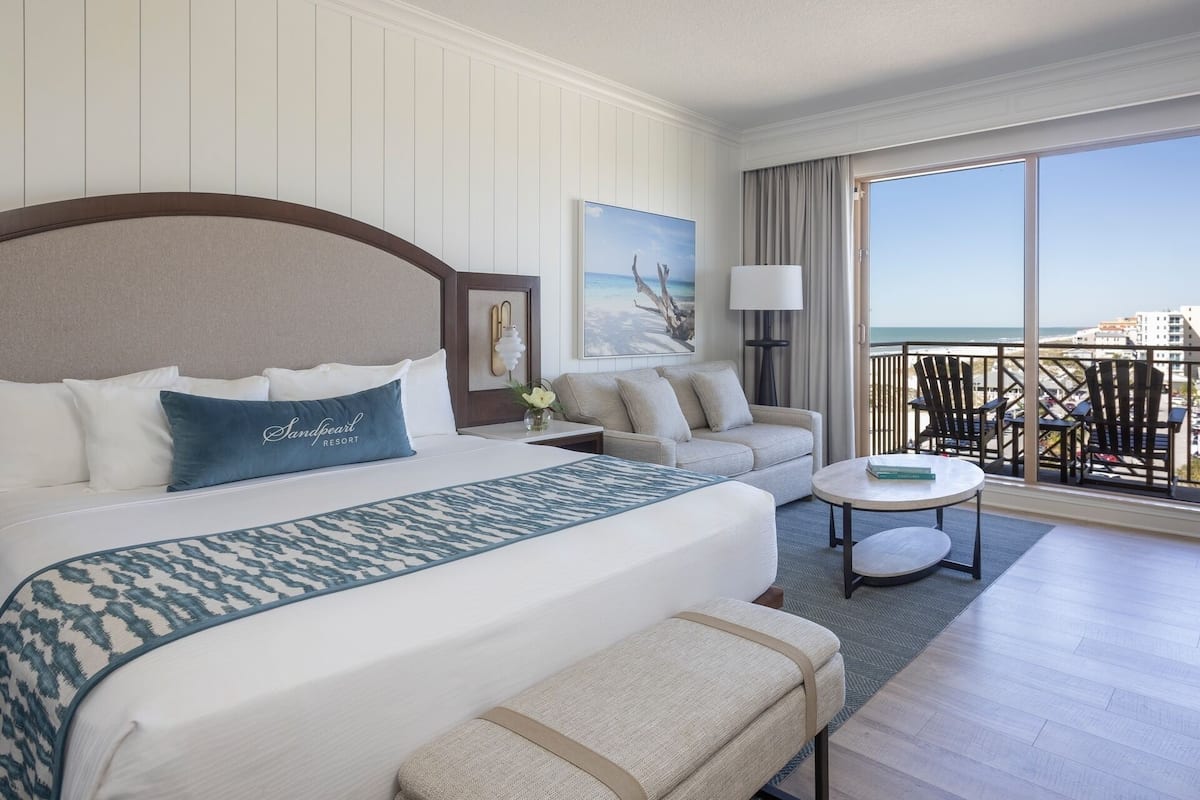 Room, 1 King Bed, Balcony (Partial Coastal View) | 1 bedroom, premium bedding, minibar, in-room safe