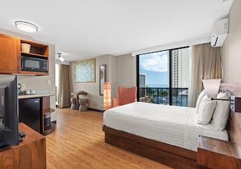 Standard Room, Partial Ocean View | Living area | 32-inch LCD TV with satellite channels, TV at Castle Bamboo Waikiki Hotel
