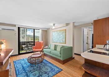 Suite, 1 Bedroom, Kitchenette, Mountain View | Living room | 32-inch LCD TV with satellite channels, TV at Castle Bamboo Waikiki Hotel