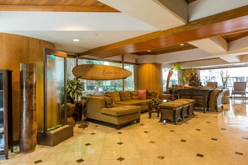 Sitting area in hotel lobby at Castle Bamboo Waikiki Hotel