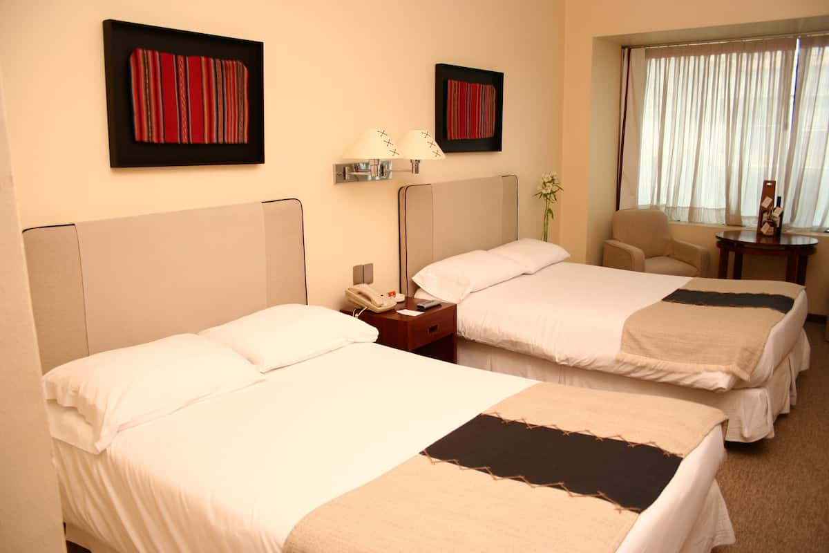 Premium bedding, down comforters, pillowtop beds, minibar