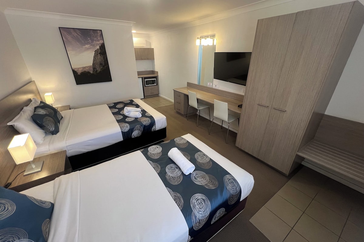 Chambre, plusieurs lits