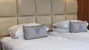 Desk, iron/ironing board, free cribs/infant beds, free rollaway beds