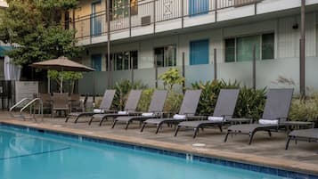Outdoor pool, open 10:00 AM to 9:00 PM, pool umbrellas, pool loungers