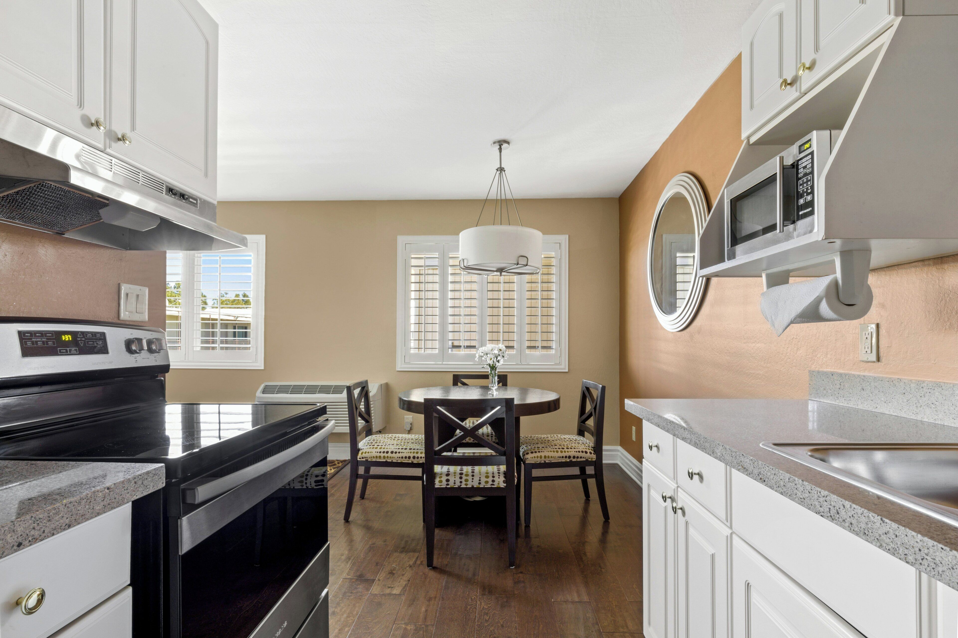 Coffee/tea maker, fridge, microwave, paper towels