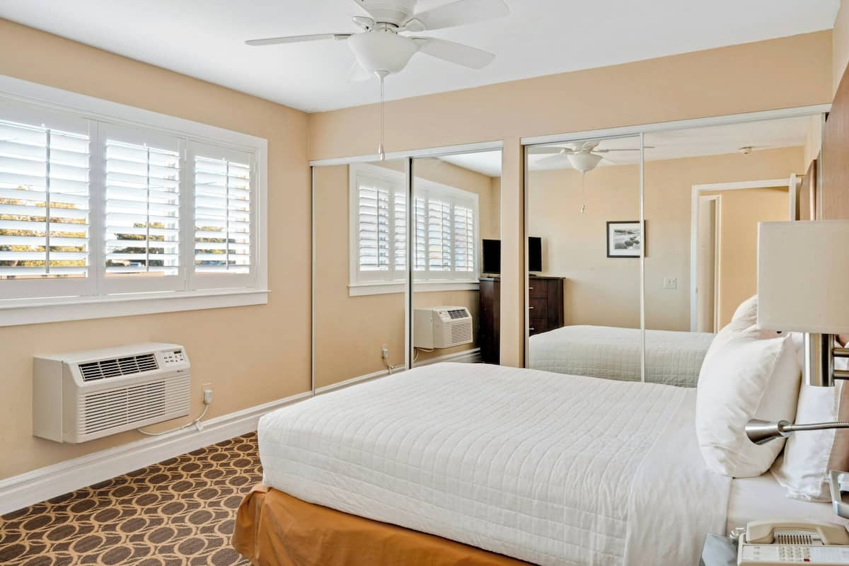 Premium bedding, pillow-top beds, in-room safe, desk