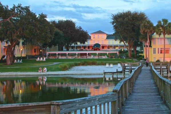 Enjoy waterfront views from the balcony and covered seating area of this hotel.