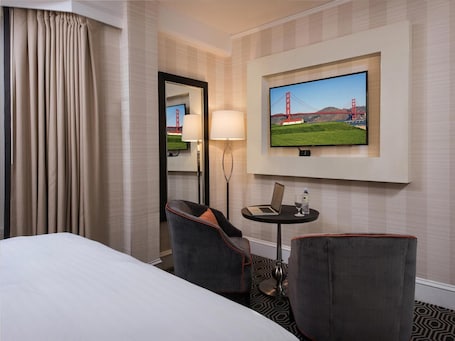 Premium bedding, pillow-top beds, in-room safe, desk. Inn At Union Square
