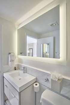 Shower, designer toiletries, hair dryer, bathrobes at Inn At Union Square