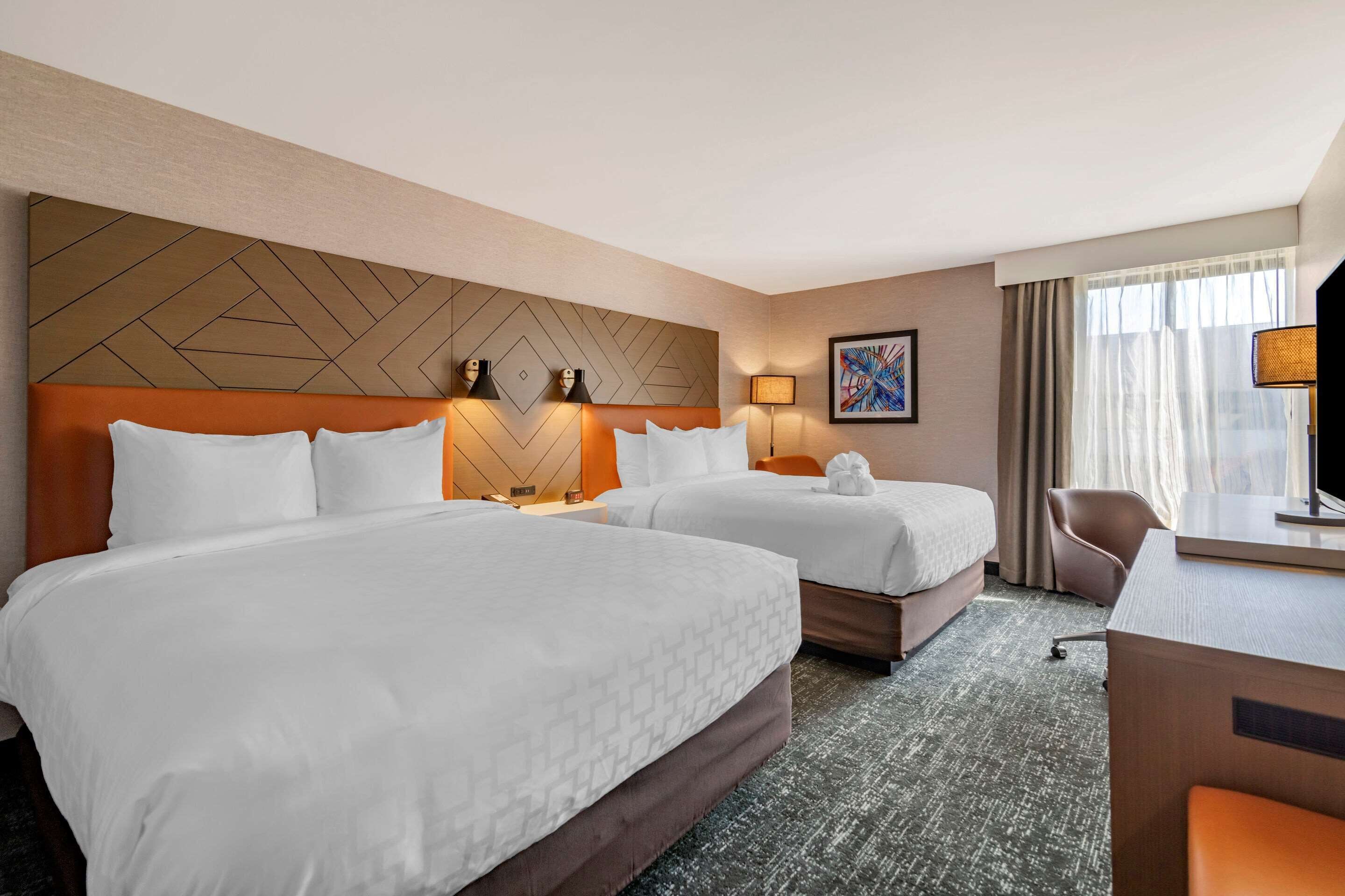 desk, laptop workspace, blackout curtains, iron/ironing board