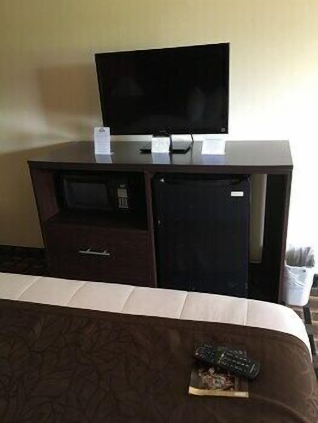 Premium bedding, desk, blackout drapes, iron/ironing board