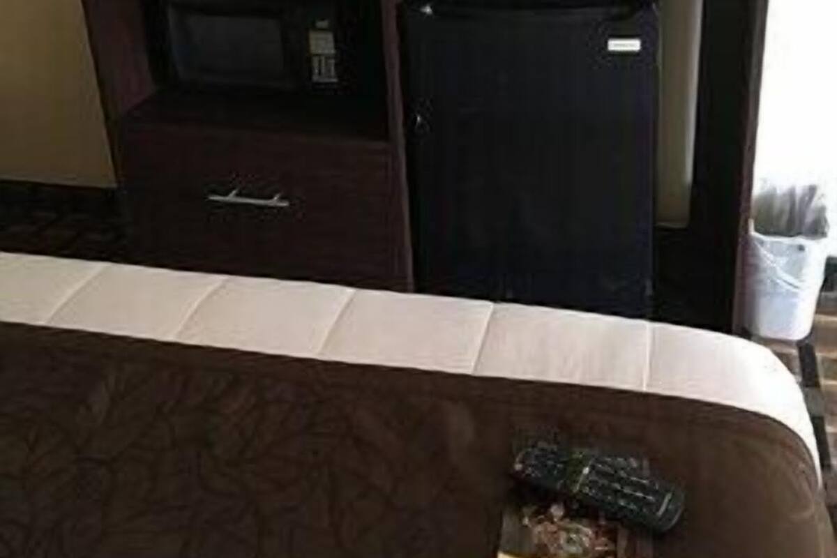 Premium bedding, desk, blackout drapes, iron/ironing board