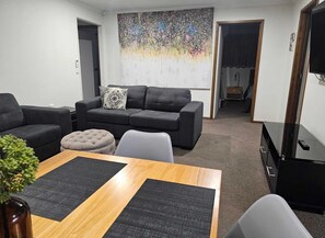 Family Apartment, 3 Bedrooms, Non Smoking, Balcony | Living area | 45-inch Smart TV with digital channels, Netflix, streaming services