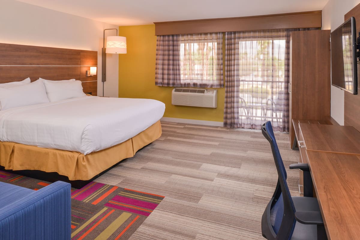 Premium Room, 1 King Bed, Balcony | In-room safe, desk, iron/ironing board, free cribs/infant beds