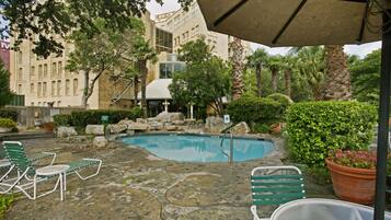 Outdoor pool, open 9:00 AM to 10:00 PM, pool umbrellas, pool loungers