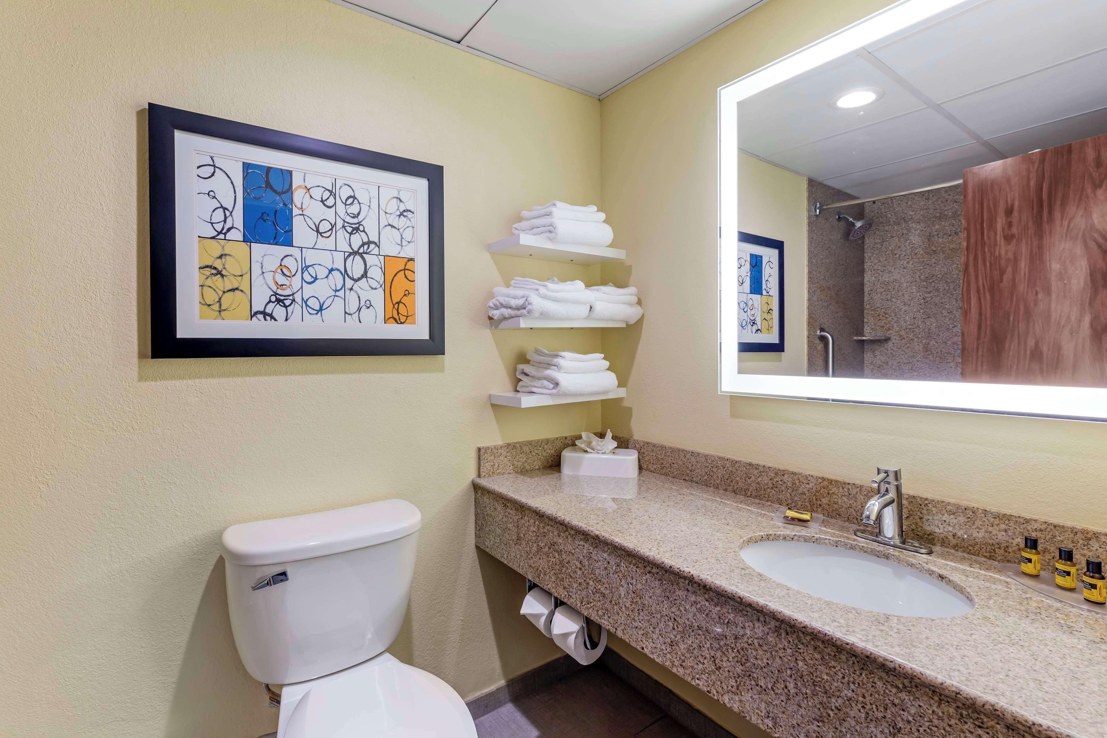 standard room, 2 queen beds, non smoking, refrigerator & microwave | bathroom | combined shower/bathtub, eco-friendly toiletries, hair dryer, towels