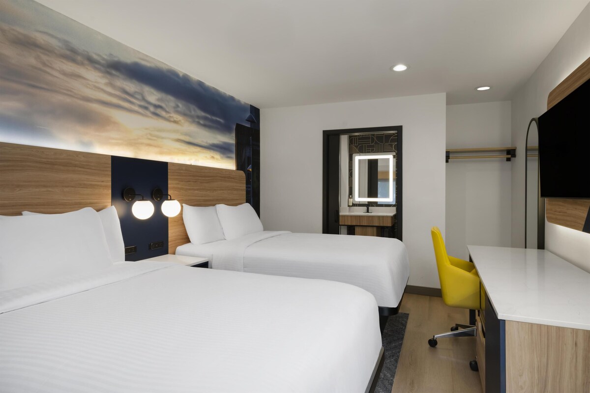 Premium bedding, desk, iron/ironing board, free Internet