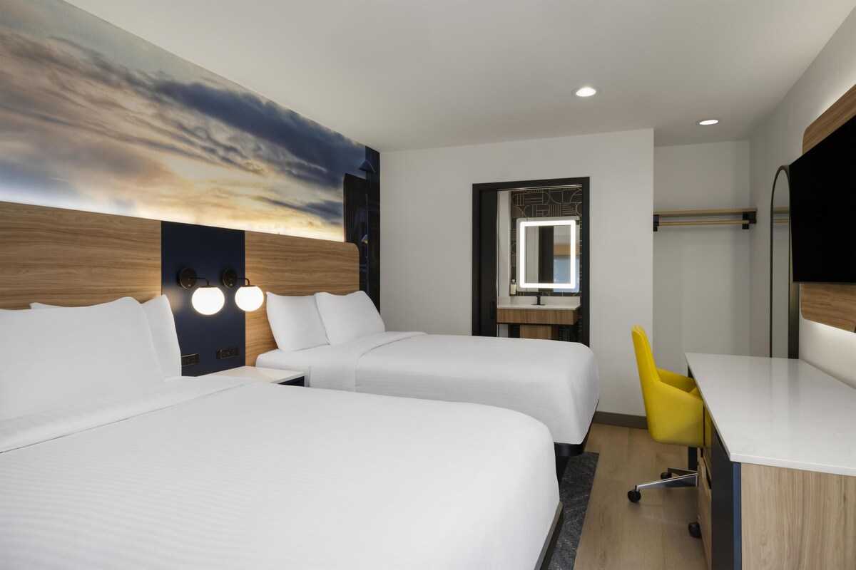 Premium bedding, desk, iron/ironing board, free Internet