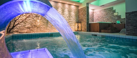 Indoor pool, seasonal outdoor pool, pool umbrellas, pool loungers